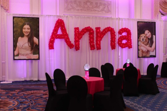 Hot Pink Sculpture Name in Balloons on LED Curtain with Blowup Photos