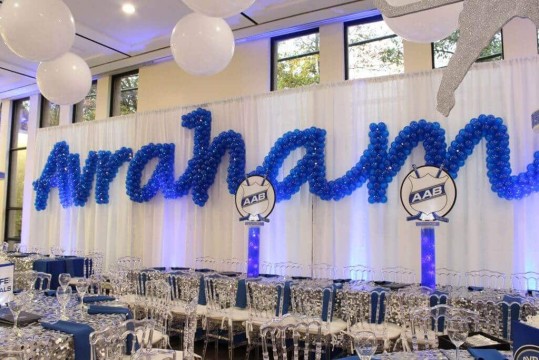 Blue Name in Balloons Sculpture on LED Curtain for Hockey Themed Bar Mitzvah