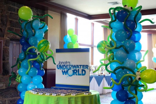 Underwater Themed Seating Card Display with Custom Logo & Octopus Balloon Columns