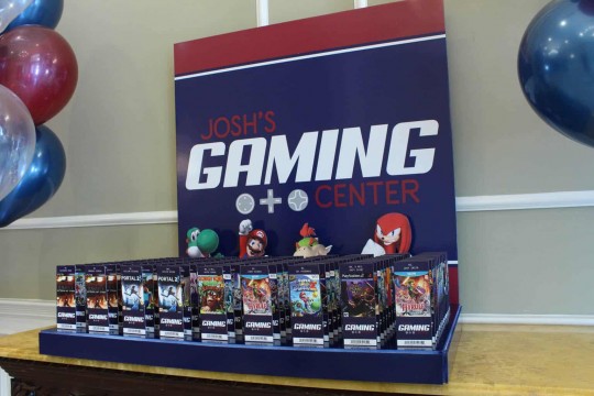 Video Game Themed Seating Card Display with Video Game Cover Tickets
