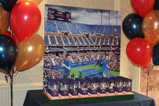 Tennis Themed Seating Card Display with Blowup Tennis Court Background and Photo Cutouts