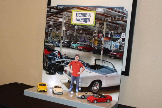 Car Themed Bar Mitzvah Display with Blowup Photo of Garage & Car Props