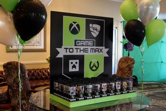 Video Game Themed Seating Card Display with Custom Logo