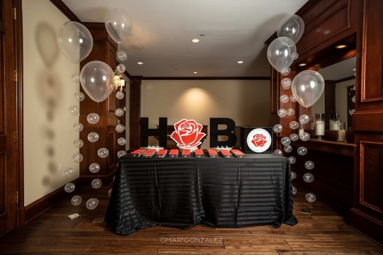 Rose Themed Bat Mitzvah Seating Card Display with Cutout Initials and Bubble Balloons