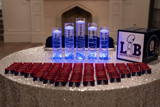 Giants Themed Entrance Table with LED Cylinders & Logo Place Cards