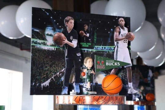 Bucks Themed Centerpiece with Blowup Stadium and Photo Cutouts