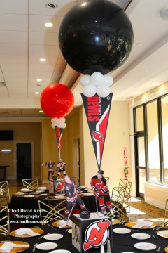Hockey Themed Centerpiece with Cutout Player & Floating Pennants