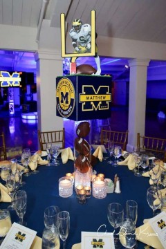 Michigan Themed Centerpiece with Custom Logos on LED Cylinder with Footballs