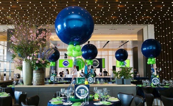 Tennis Themed Centerpiece with Cutout Photos & Navy & Lime Balloons at Riverpark, NYC