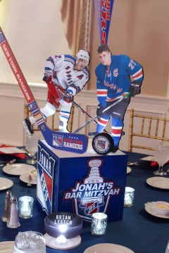 Rangers Themed Centerpiece with Photo Cutouts, Hockey Sticks & Pucks & Custom Logo