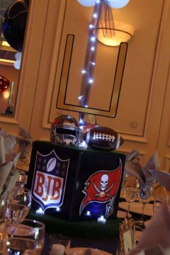 Football Themed Cube Centerpiece with Sports Equipment Toppers