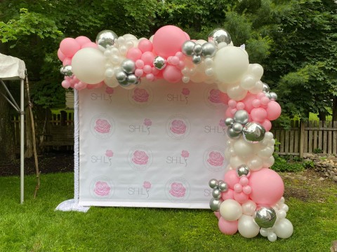 Amazing Custom Step & Repeat with Two Variation of Logos and Beautiful Pink & White Half Organic Arch