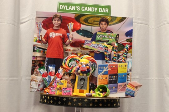 Dylan's Candy Bar Themed Centerpiece with Photo Cutouts and 3D Props for NYC Themed Bar Mitzvah