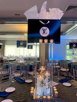 Custom Louis Vuitton Bag Centerpiece with LED Orchids for Shopping Themed Bat Mitzvah