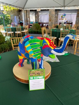 Custom Recycled Elephant Centerpiece with Custom Curiosity Sign for Jungle Themed Outdoor Bar Mitzvah