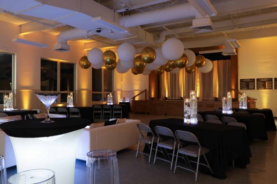 Amber Uplighting with White & Gold Ceiling Balloons for Sweet Sixteen