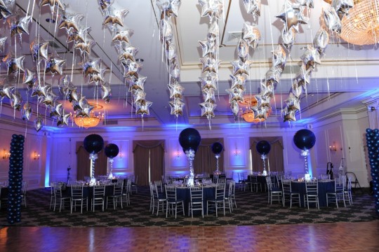 Blue Uplighting with Navy Balloon Centerpieces and Canopy over Dance Floor