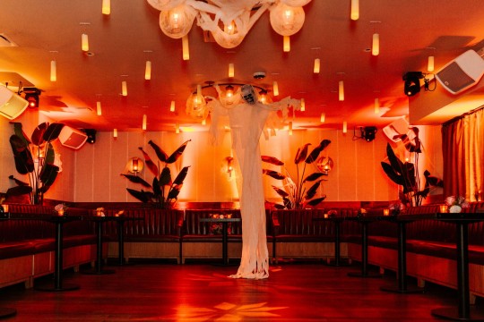 LED Uplighting with Hanging Candles Ceiling Treatment for Halloween Party at Catch Steak, NYC