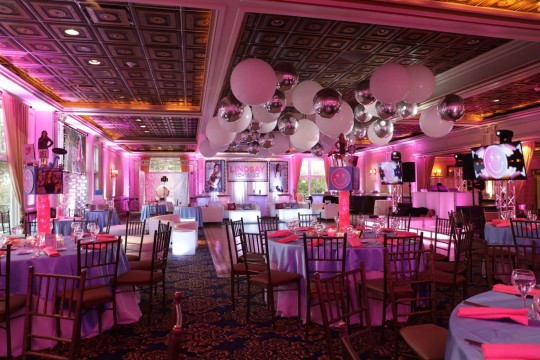 Hot Pink Uplighting with Ceiling Treatment, Custom Centerpieces and LED Lounge Setup at VIP Country Club