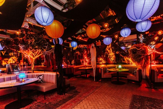 Orange Uplighting and LED Lanterns Ceiling Treatment for Halloween Party at Catch Steak NYC